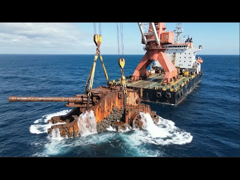 Recovering a World War II-era artillery piece from the seabed.