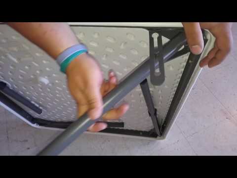 Folding and locking legs on square table