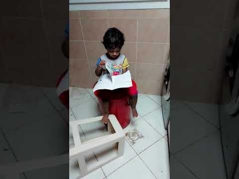 Baby funny reading//Srivardhan unnikrishnan// it's OK to read upside-down 😘