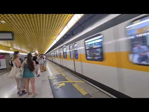 M3 Metro (subway yellow line) approaching Duomo station in Milan