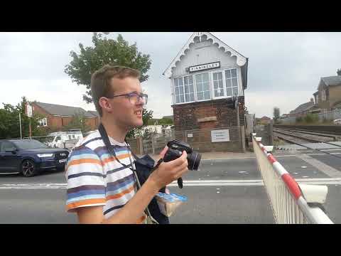 dissued finningley station crossing gates closing with 156 passing through