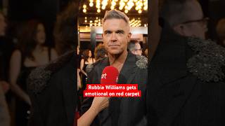 Robbie Williams gets emotional on the #betterman red carpet