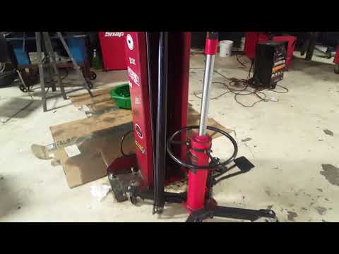 How to change the hydraulic cylinders on a Ammco / Challenger lift