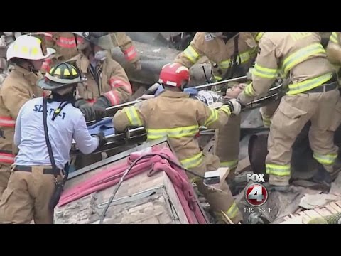 Building collapses with worker inside