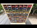 105 Miniature Cars And A Building Style Miniature Car Storage Case