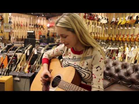 Marie Espinosa playing her latest tune on a Martin here at Norman's Rare Guitars