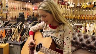 Marie Espinosa playing her latest tune on a Martin here at Norman's Rare Guitars
