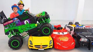 Vlad and Nikita ride on toy monster truck and goes through the cars for kids