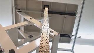 Tsubaki raising lift table using Zip Chain Lifter