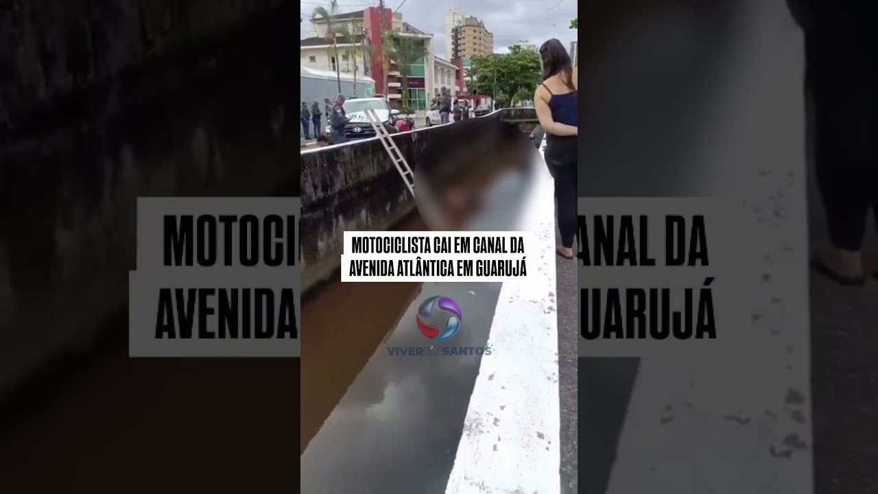 Motociclista cai em canal da Avenida Atlântica em Guarujá.