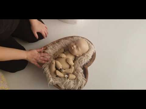 How to pose a newborn in a heart prop. Newborn photography posing.