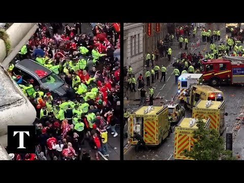 Car Crashes Into Crowd During Liverpool Premiere League Victory Parade