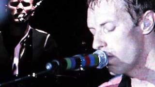 Chris &quot;messes up&quot; in The Hardest Part, Coldplay live at Wembley, 2009, with Postcards From Far Away
