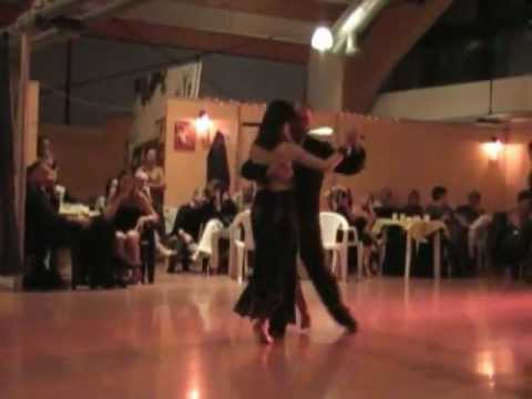  Luigi Bisello  and  Tania Grisostomi  are  dancing  to  a  nontraditional song  in  2012