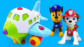 Spielzeug Video für Kinder auf Deutsch. Marshall und Chase bauen ein Flugzeug. Video mit Paw Patrol