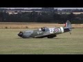 Dramatic moment a replica Spitfire lands without undercarriage