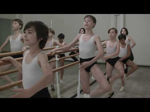 The boys are doing ballet at the barre