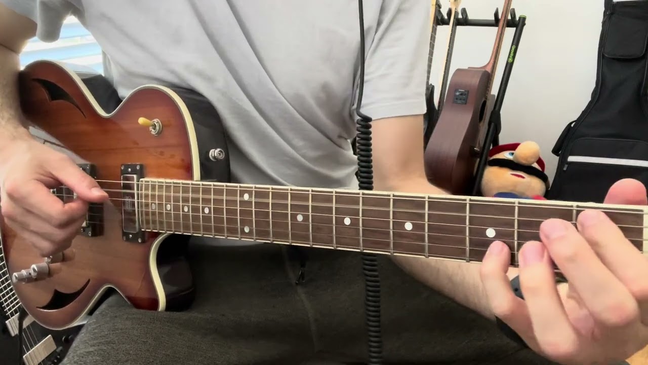 Roberto Barlocci playing Ennio Morricone's "The Crisis" on guitar, highlighting the b2 minor second interval.