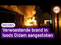 Verwoestende brand in loods Didam aangestoken