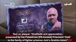 Plaque honoring Jum'a Adam