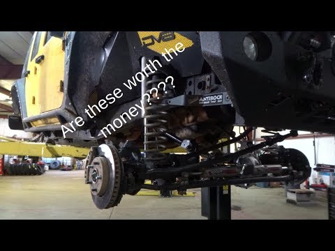 installling curries anti rock sway bar kit in a jeep jk