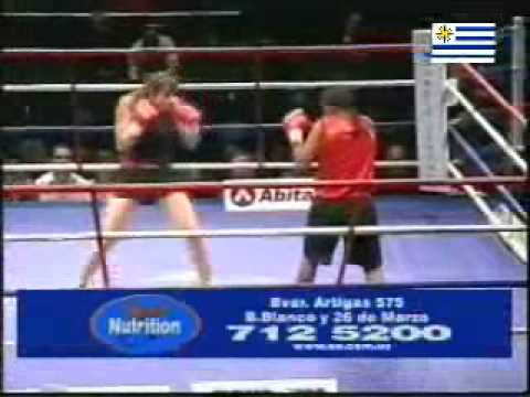 Chris "El Bombón Asesino" Namús vs. Nerys "La Elegante" Rincón