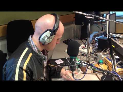 The Incredible Mr Goodwin: Straitjacketed TV daredevil dangles feet ...