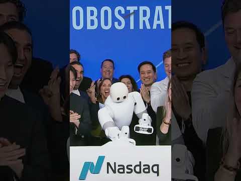 Dyna Robotics' 'Taku' rings the Nasdaq closing bell with the RoboStrategy team