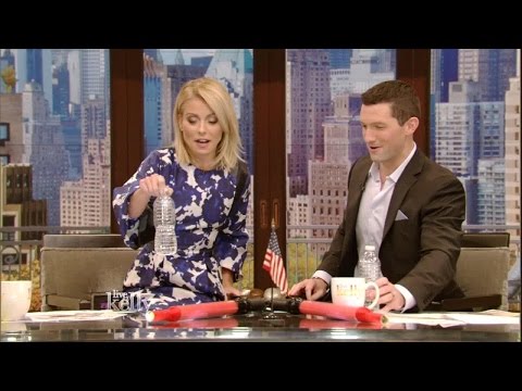 Kelly and Richard Curtis Try Flipping Bottles