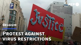Milhares protestam na Bélgica contra regras da Covid | AFP