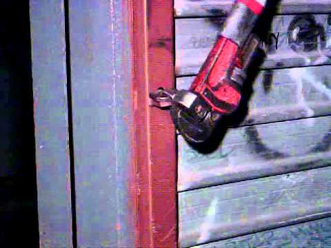 Forcing a padlock with a Pipe wrench
