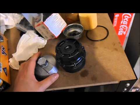 2009 (10th generation) Toyota Corolla oil filter housing and oil filter wrenches