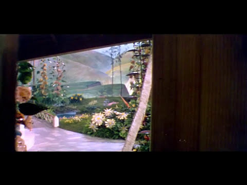 Final trailer card over the Yellow Brick Road as end titles roll
