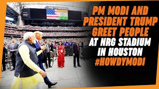 PM Modi and President Trump greet people at NRG St