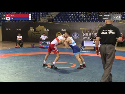 1/2 FS - 57 kg: S. ATLI (TUR) v. S. KIM (KOR)