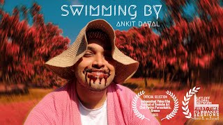 Swimming By Music Video