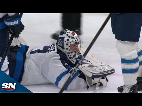 Jets' Connor Hellebuyck Makes Incredible Save On Blackhawks' Connor Bedard
