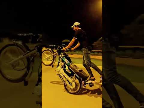 wheeling on 125 Honda wheeling #weeling #46king #shahnawaz46 #stunt #pakistan #weler #jhelum #46