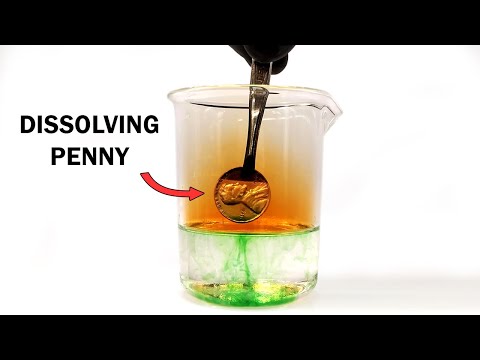 Watch A Penny Completely Dissolve After Being Dropped In Nitric Acid