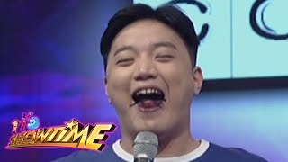 It's Showtime Copy-Cut: Ryan Bang is forced to stick his tongue out while singing a Christmas song