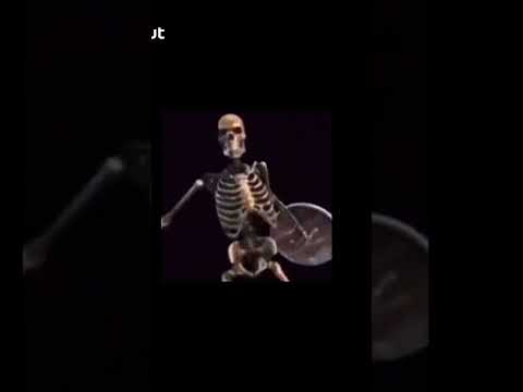 skeleton banging on shield