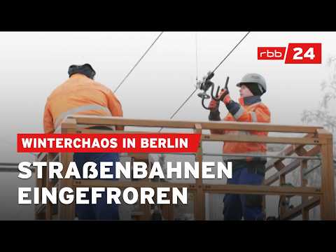 Berlin: Oberleitungen müssen per Hand enteist werden