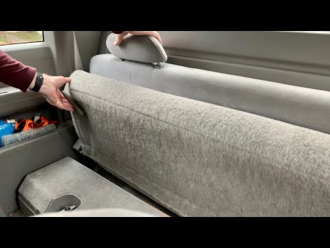 How to fold down the back seat on a Chevrolet truck