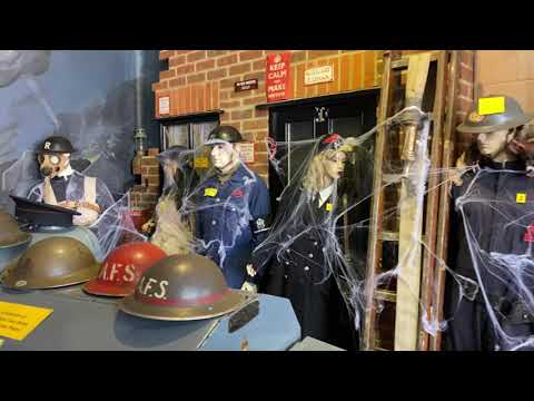 mannequin-man performming as a Museum Dummy: Halloween event at the Essex Fire Museum, the mannequins in the WW2 fire section have been captured by a huge spider for Essex Fire Museum on 28/10/2021