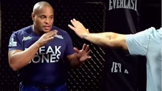 Daniel Cormier demonstrates plan to deal with height & reach of Jon Jones