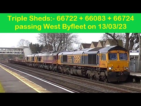 GBRf 66722 + DBC 66083 + GBRf 66724 passing slowly past West Byfleet on 13/03/23