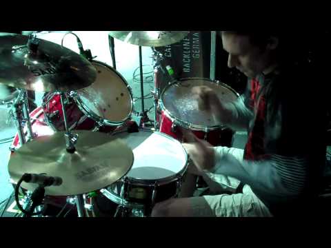 Drummer Timothy Java playing drums on Violent By Nature with Darkest Hour