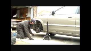 Mazda Protege front brake job and repair