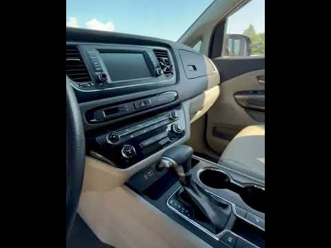 фото kia carnival iii 0
