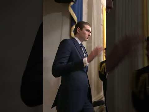 Barron Trump towers over guests at President Trump's inauguration